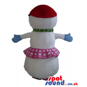 Snow woman with a pink and white skirt, a red hat, light-blue