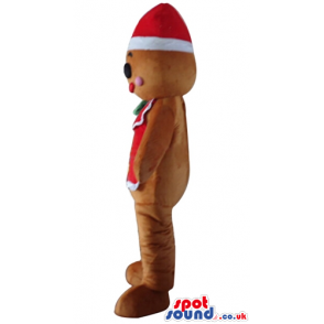 Ginger bread man wearing a santa claus hat and a red vest with