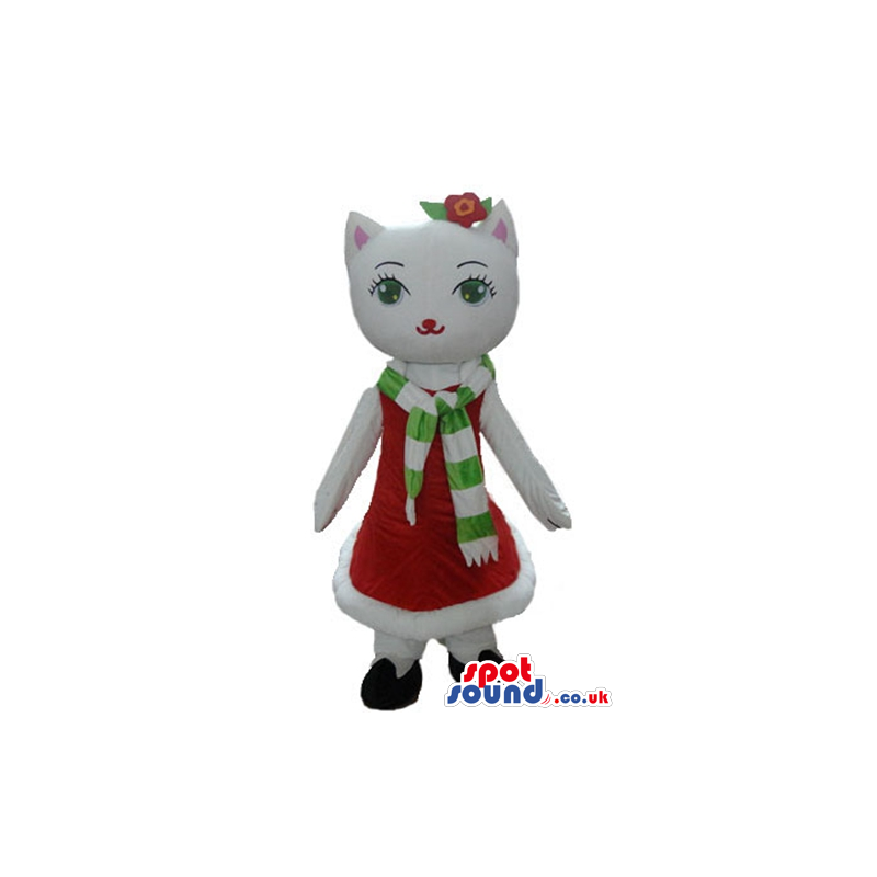 White cat wearing a long red dress and a white and green scarf
