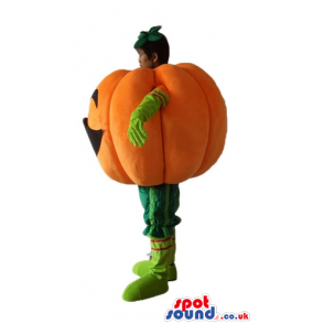 Smiling orange pumpkin with green arms and legs - Custom Mascots