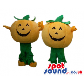 Couple of smiling orange pumpkins with green arms and legs -