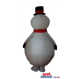 Snowman with round black eyes wearing a black tophat and a red