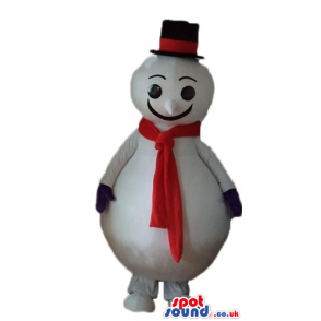 Snowman with round black eyes wearing a black tophat and a red