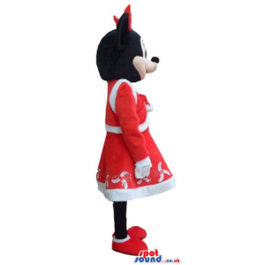 Minnie mouse dressed as miss santa claus with a red and white