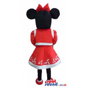 Minnie mouse dressed as miss santa claus with a red and white
