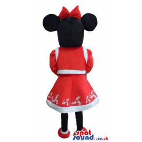 Minnie mouse dressed as miss santa claus with a red and white