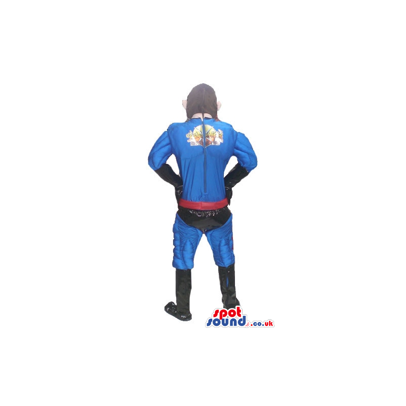 Muscleous super hero dressed in a blue shiny suit, black