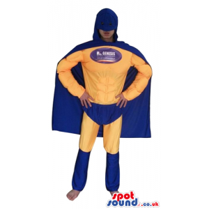 Super hero wearing a yellow suit, blue trunks, a blue mask and