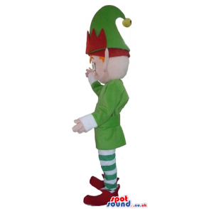 Elf with ginger hear and pointy ears wearing a green jacket