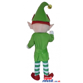 Elf with ginger hear and pointy ears wearing a green jacket