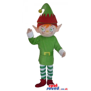 Elf with ginger hear and pointy ears wearing a green jacket