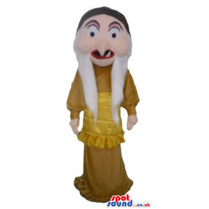 Witch with a long nose and white hair wearing a long golden