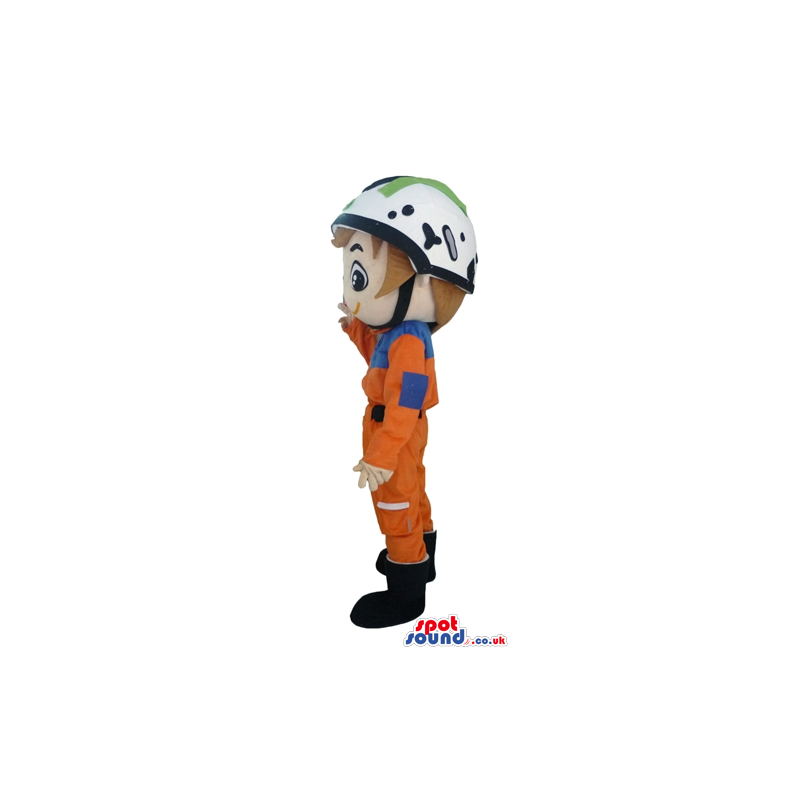 Racer wearing an orange suit, black boots, and a white helmet -