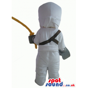 Ninja lego man wearing a white suit and holding a yellow sword