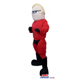 Blond muscleous super hero wearing a red and black suit and a