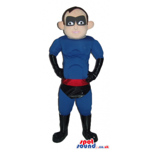 Muscleous super hero dressed in a blue suit, black trunks