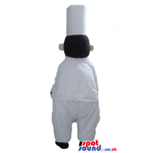 Fat chef with a black moustache wearing a white jacket with