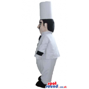 Fat chef with a black moustache wearing a white jacket with