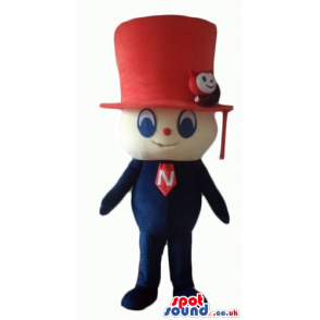 Man with big blue eyes wearing a huge red tophat, a blue suit