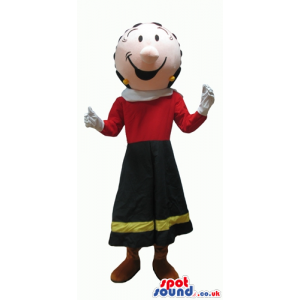 Olive oyl wearing a long black fand yellow skirt and a red