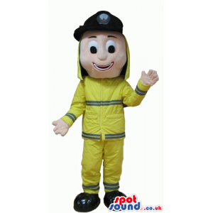 Smiling man wearing a yellow fireman suit and cap - Custom