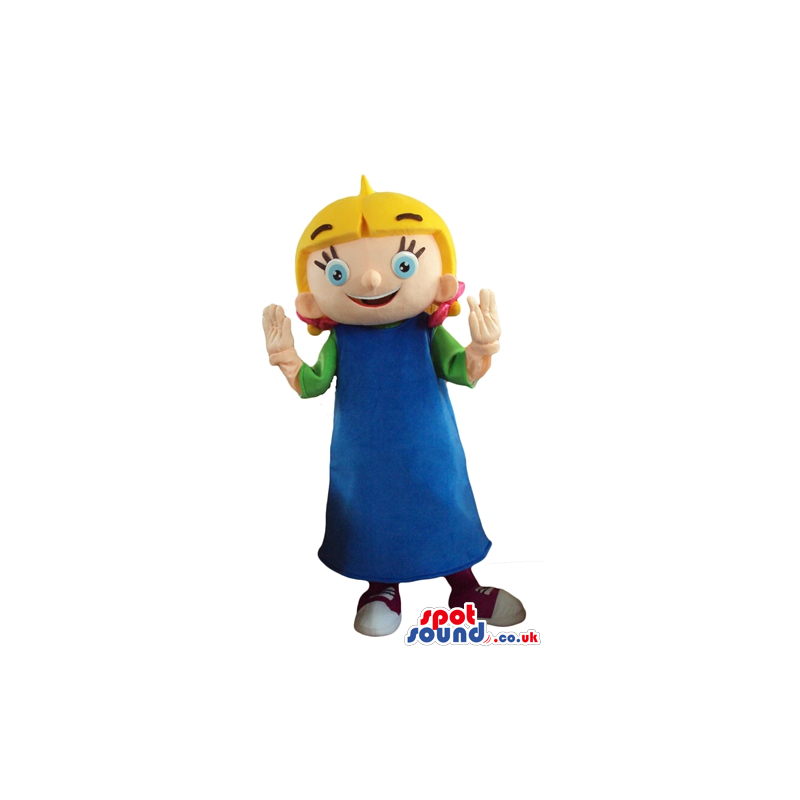 Blonde girl with big eyes wearing a green t-shirt, a blue dress