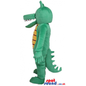 Green crocodile with big eyes and a striped yellow and black