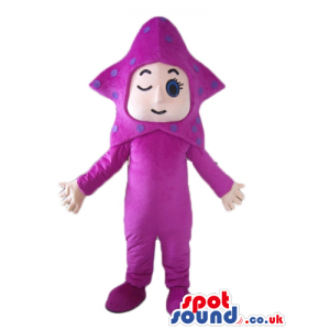 Boy winking an eye wearing a violet suit and a baclava helmet