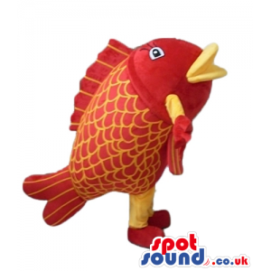 Red fish with yellow legs and arms and red hands and feet -