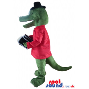 Green crocodile with blue popping eyes, wearing a red jacket. a