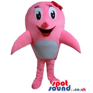 Smiling pink and grey whale with big eyes and a red bow on the