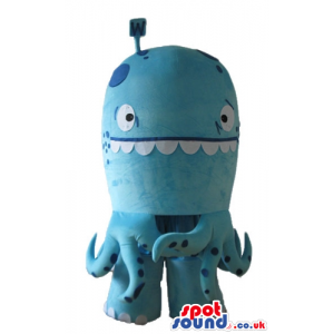 Fat light-blue octopus with big eyes and big white teeth -