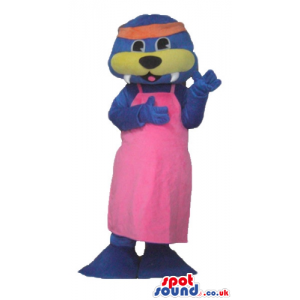 Purple seal with a yellow nose wearing a bright pink dress and