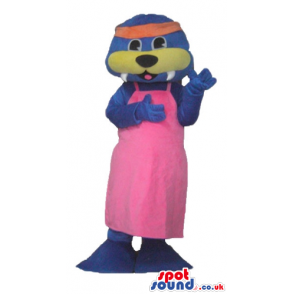 Purple seal with a yellow nose wearing a bright pink dress and