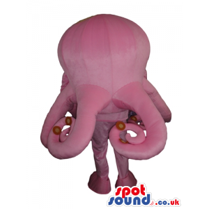 Big pink octopus with yellow and blue eyes and a round mouth -
