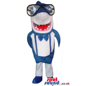 Blue shark wearing big glasses with a black frame, a blue bow