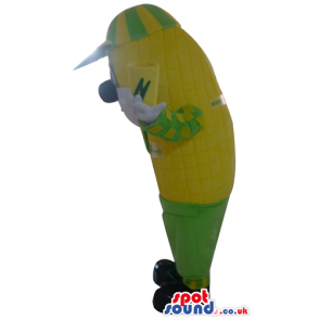 Yellow banana with a big black nose wearing a yellow and green