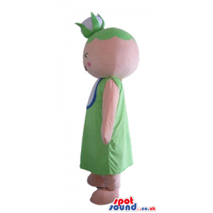 Pink girl with green hair and small eyes wearing a green dress