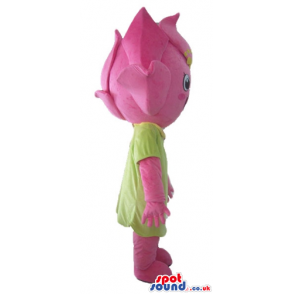 Pink flower with big eyes wearing a green and yellow dress -