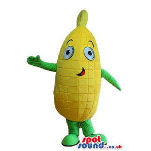 Yellow corn with big eyes and a red mouth, green arms and green