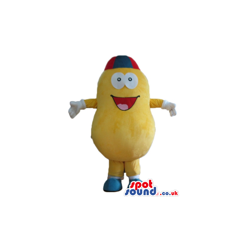Yellow pumpkin with big round eyes wearing a red and blue cap