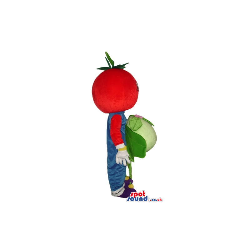 Red tomato wearing blue gardener trousers and violet shoes