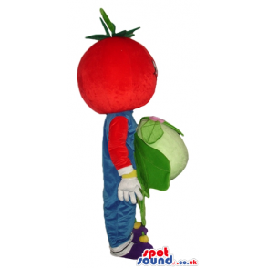 Red tomato wearing blue gardener trousers and violet shoes