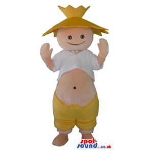 Fat smiling boy showing its belly wearing a yellow hat and