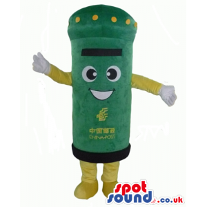 Green postbox with yellow dots on the top, big eyes and a big