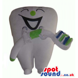 Smiling white tooth with a green nose holding a blue, green and