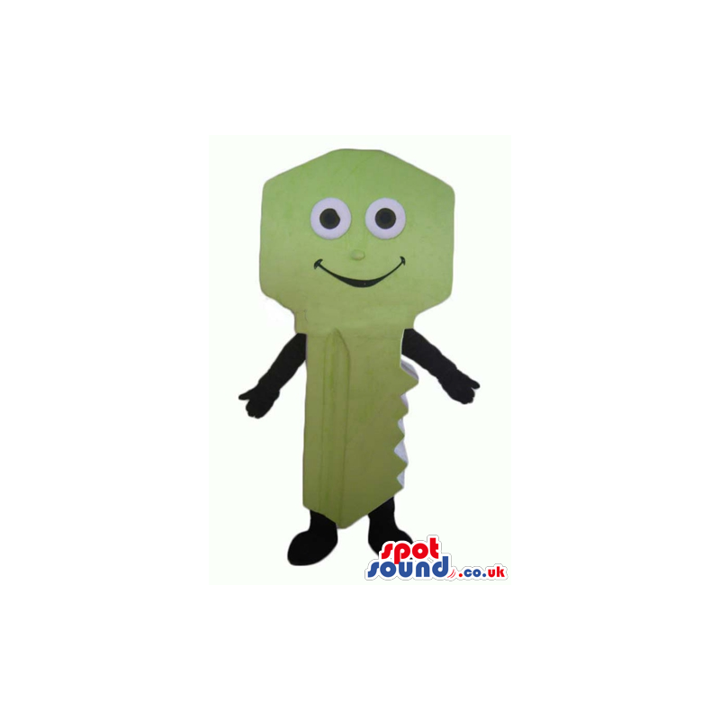 Green key with small round eyes, a big smile, black arms and