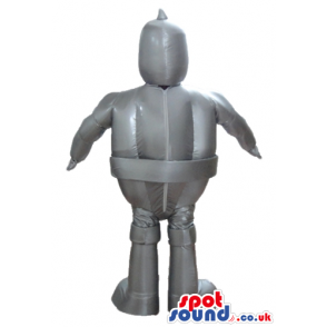 Grey robot with small black eyes and a logo on the belly -