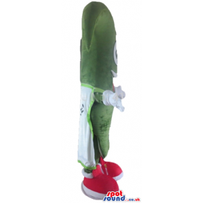 Green mascot costume with big eyes and a big open mouth wearing
