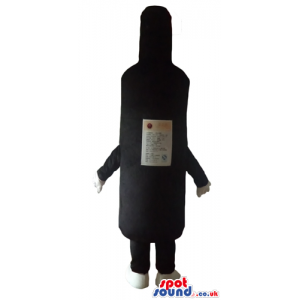 Black bottle of wine with a beige label and a yellow cap -